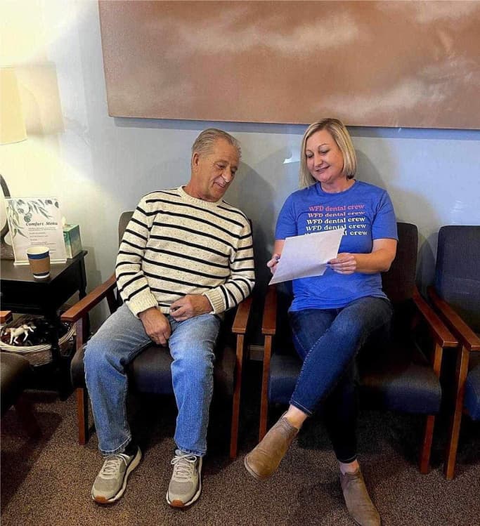 Patient consultation about insurance at Williams Family Dentistry